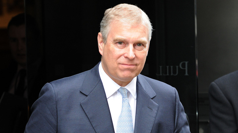 Prince Andrew wearing a grey suit