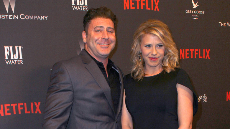 Justin Hodak and Jodie Sweetin at event