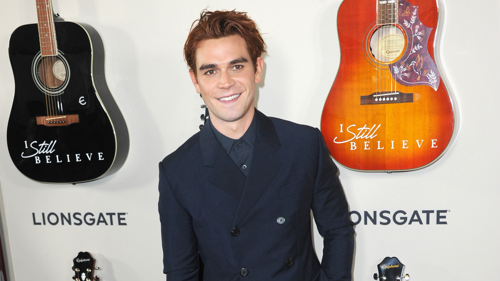 KJ Apa with guitars 