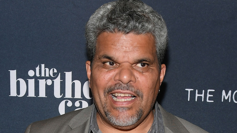 Luis Guzmán  smiling on red carpet