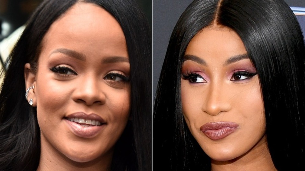 Rihanna smiling, Cardi B smirking