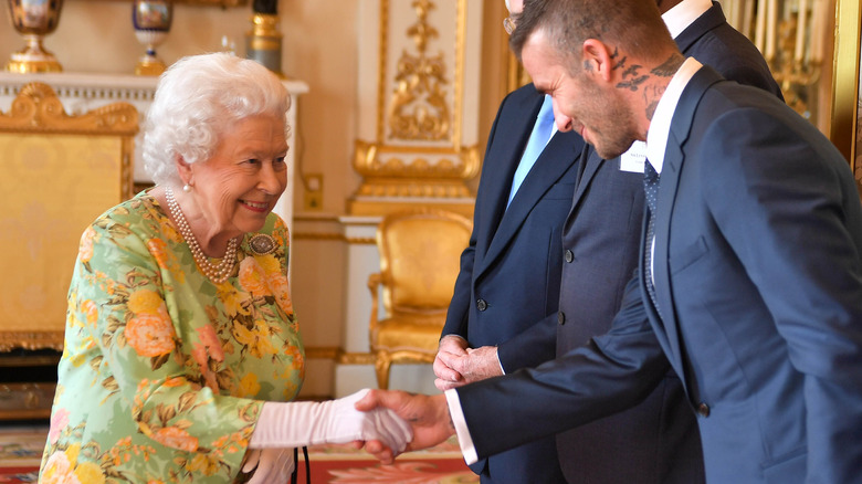 Queen Elizabeth meeting David beckham