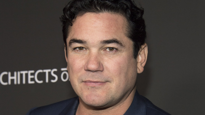 Dean Cain posing at an event