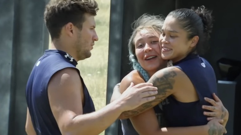 Contestants hug on The Challenge