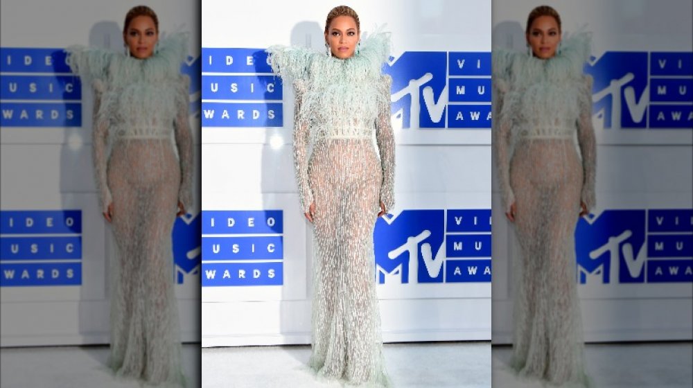 Beyoncé in a white feathered dress at the 2016 MTV VMAs