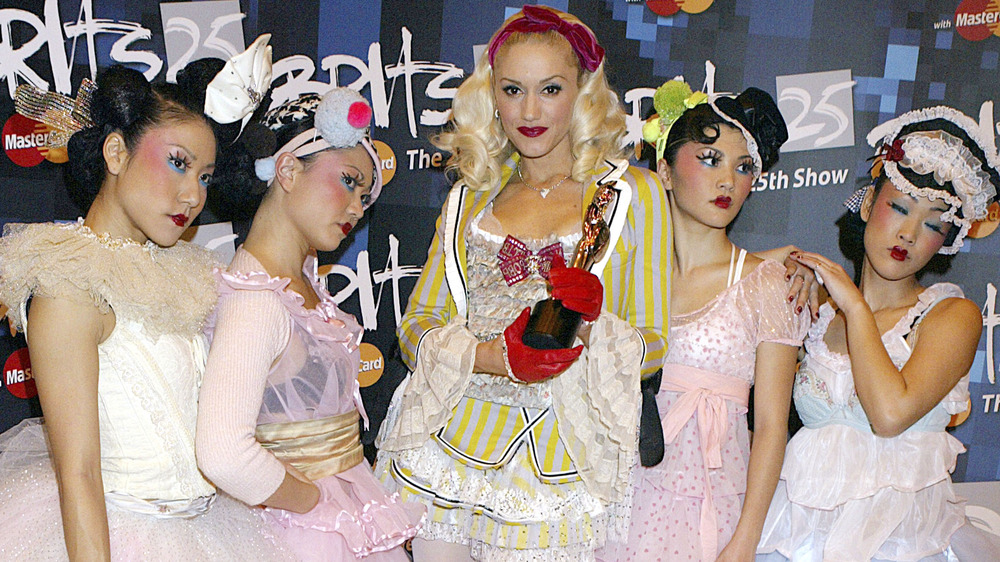 Gwen Stefani on the BRIT Awards red carpet with the Harajuku Girls