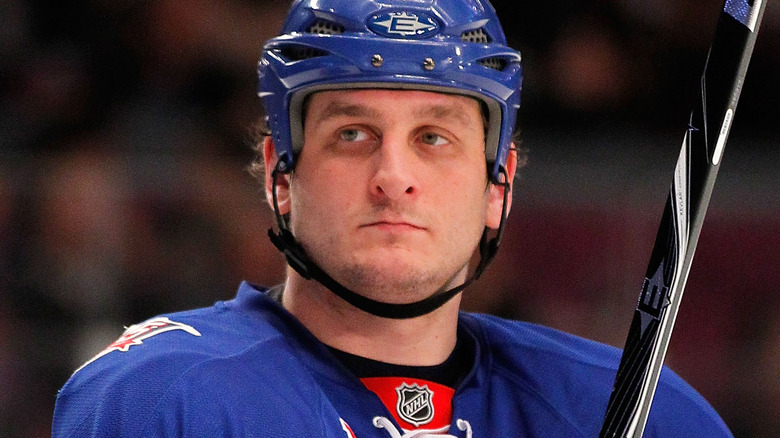 Derek Boogaard wearing hockey helmet