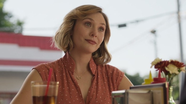 Elizabeth Olsen as Candy Montgomery smiling