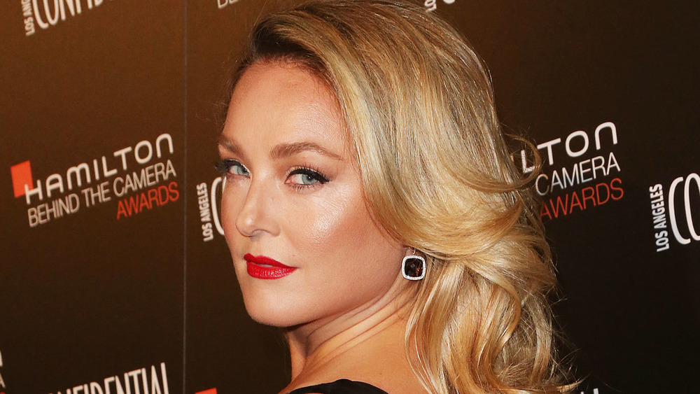 Elisabeth Rohm sporting a smoldering over the shoulder look at a premiere in New York