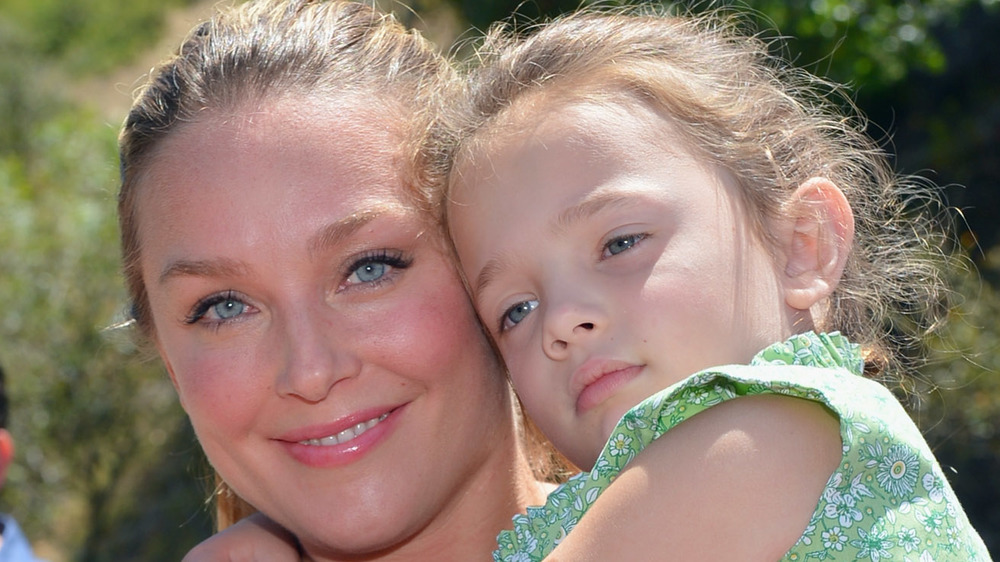 Elisabeth Rohm posing cheek-to-cheek with her daughter Easton August Anthony