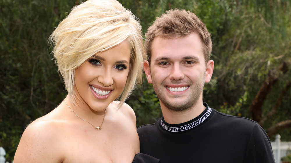 Savannah Chrisley and Chase Chrisley pose together 