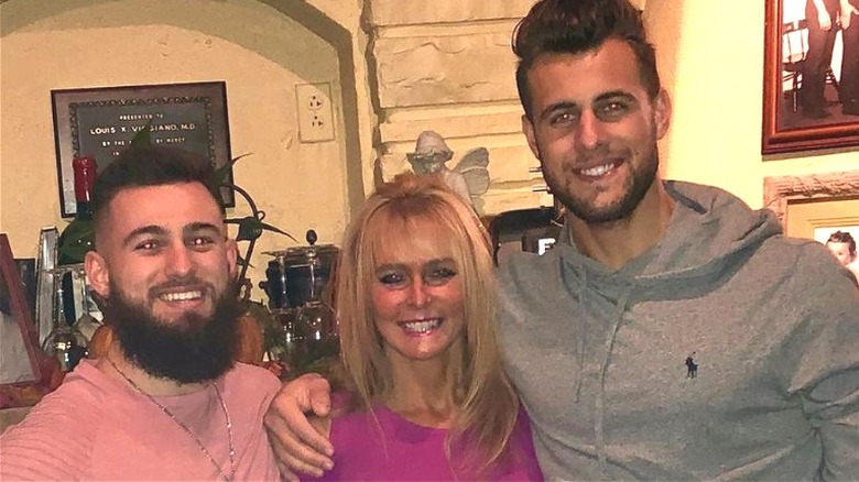 Ed, Tammy and Mitchell Eason smiling at a restaurant