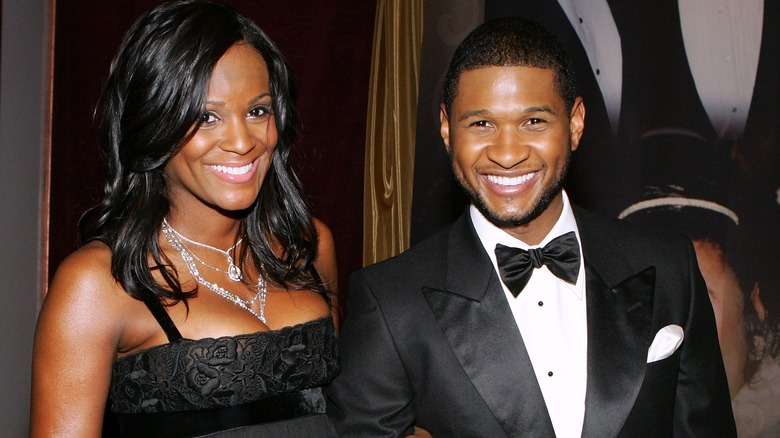 Usher and Tameka Foster smiling