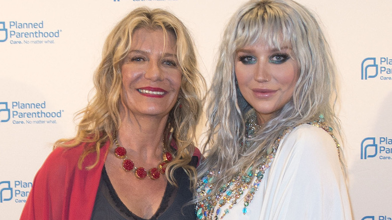 Pebe Sebert and Kesha both smiling