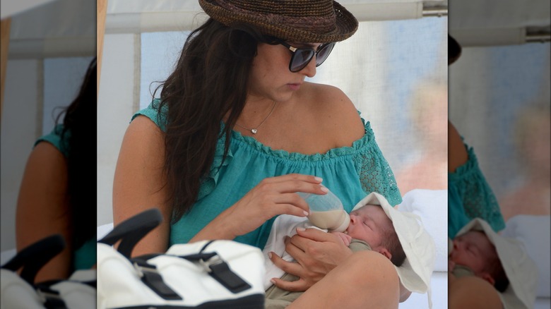 Lauren Silverman holding Eric Cowell