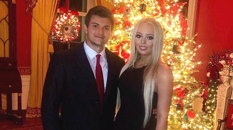 Tiffany Trump and Michael Boulos posing