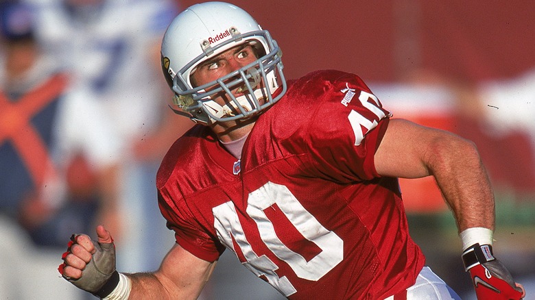 Pat Tillman wearing helmet running