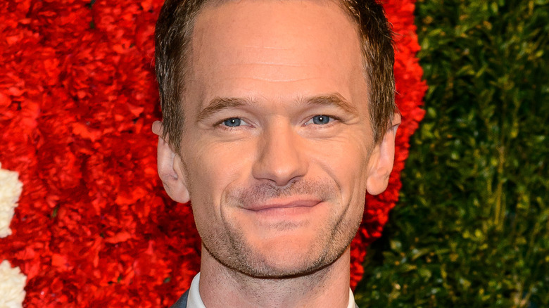 Neil Patrick Harris smiles on the red carpet