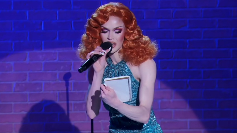 Blair St. Clair speaking into mic