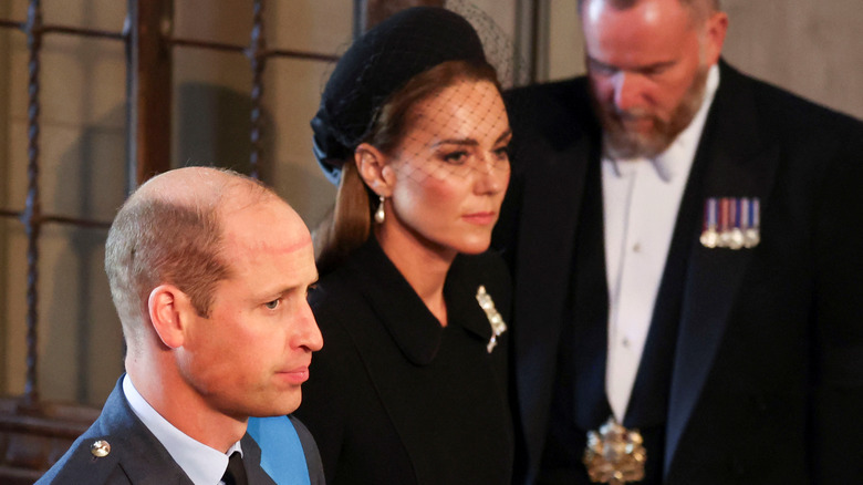 William, Prince of Wales and Catherine, Princess of Wales at the queen's procession