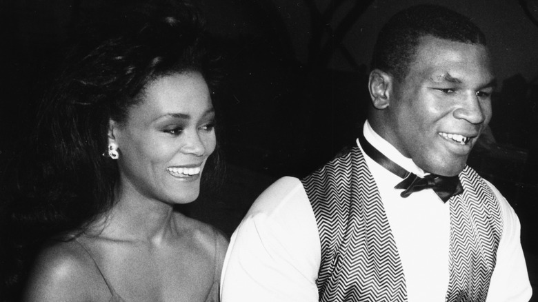 Mike Tyson and Robin Givens dressed in formalwear