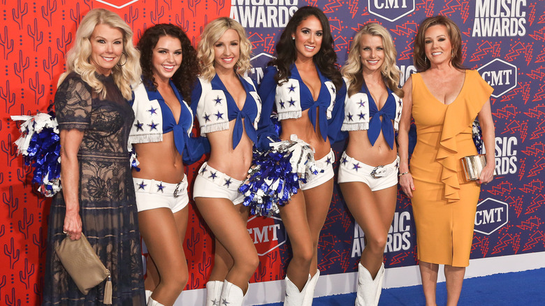 Judy Trummell, Kelli Finglass and the Dallas Cowboys Cheerleaders at the CMT awards