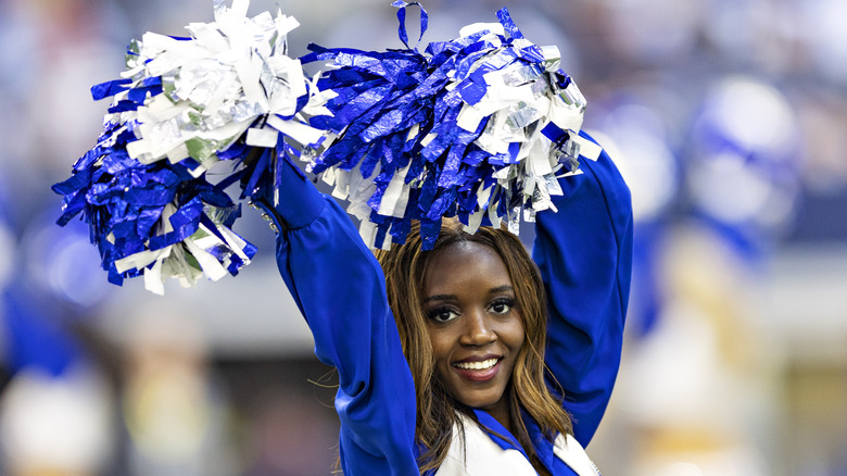 A Dallas Cowboys Cheerleader performing