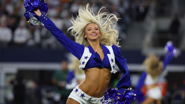 A Dallas Cowboys Cheerleader performing