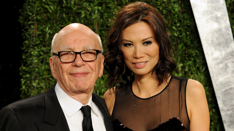 Rupert Murdoch and Wendi Deng posing on the red carpet