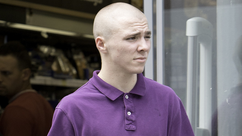 Rocco Ritchie wearing a purple shirt