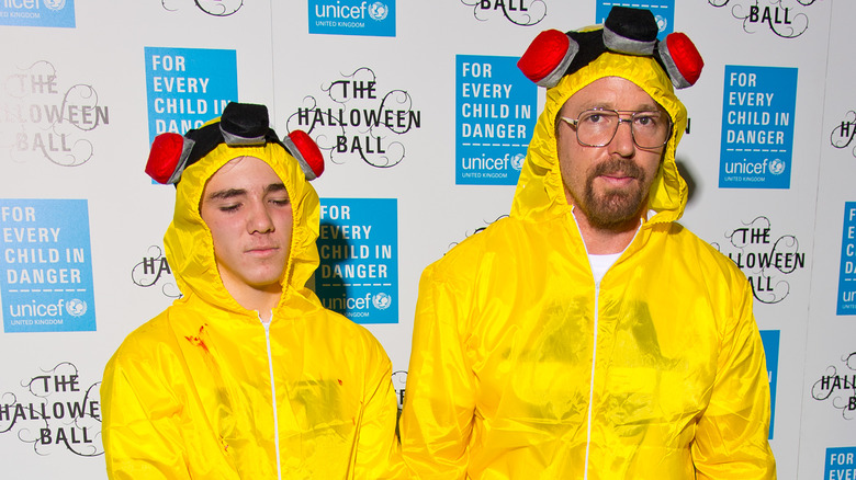 Rocco Ritchie posing with his dad, Guy Ritchie