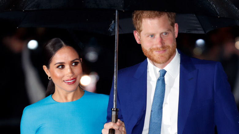 Prince Harry and Meghan Markle smiling 