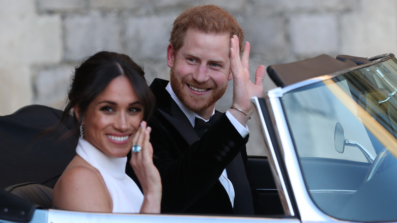 Meghan Markle and Prince Harry waving