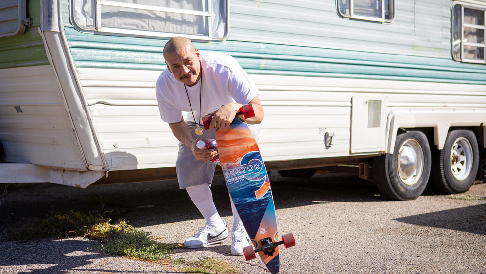 Nathan Apodaca with skateboard