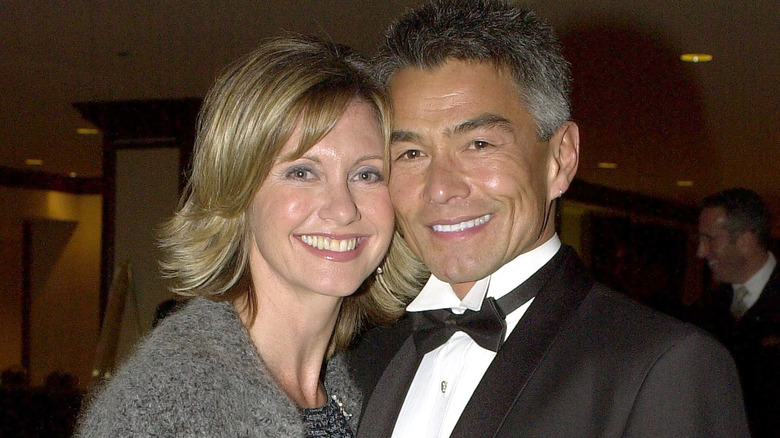 Olivia Newton-John poses with Patrick McDermott