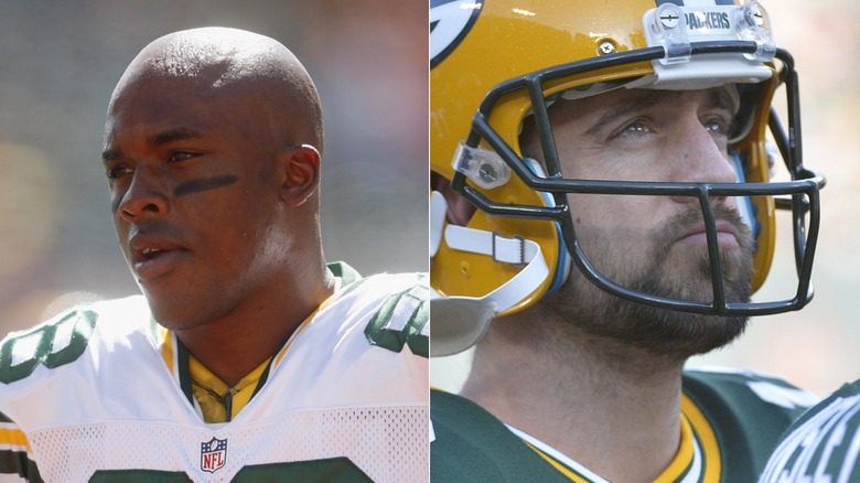 Jermichael Finley looking left, Aaron Rodgers wearing helmet