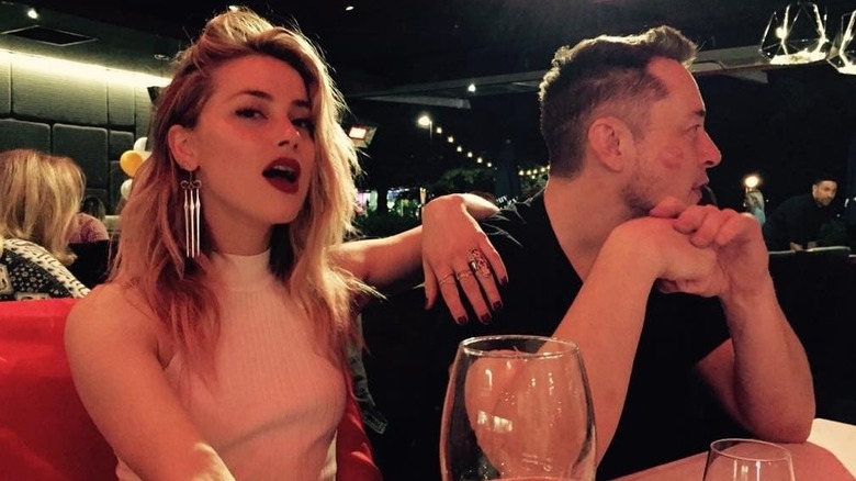 Amber Heard and Elon Musk at a restaurant