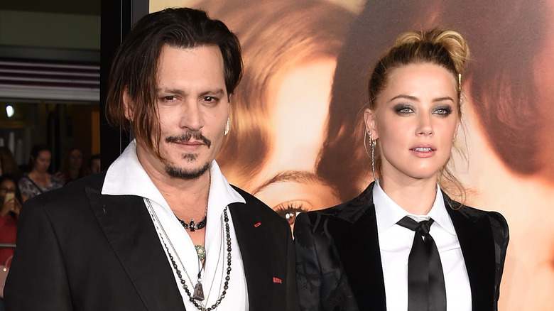 Johnny Depp and Amber Heard posing together