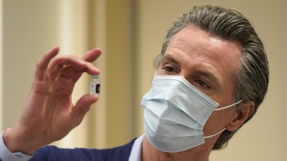 Gavin Newsom wearing a COVID mask