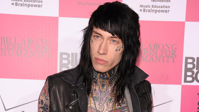 Trace Cyrus in a leather jacket