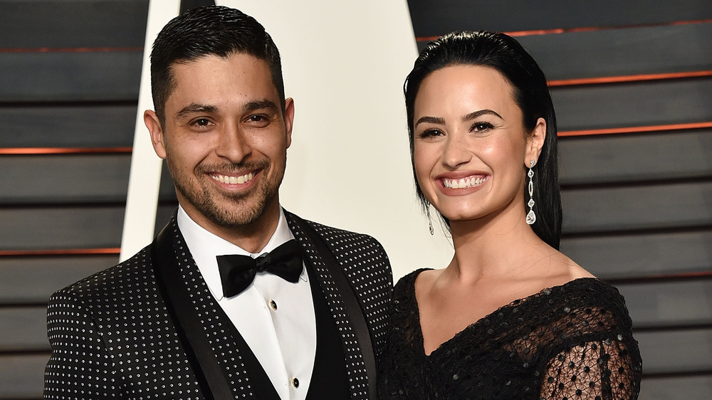 Demi Lovato and Wilmer Valderrama smiling