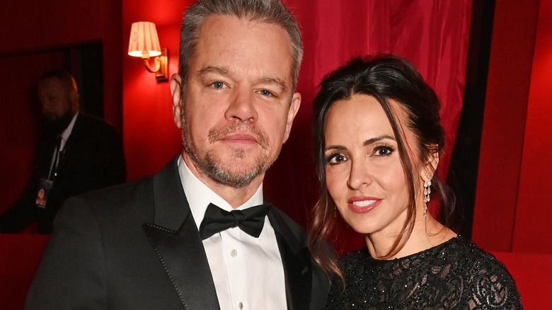 Luciana Barroso and Matt Damon on a red carpet