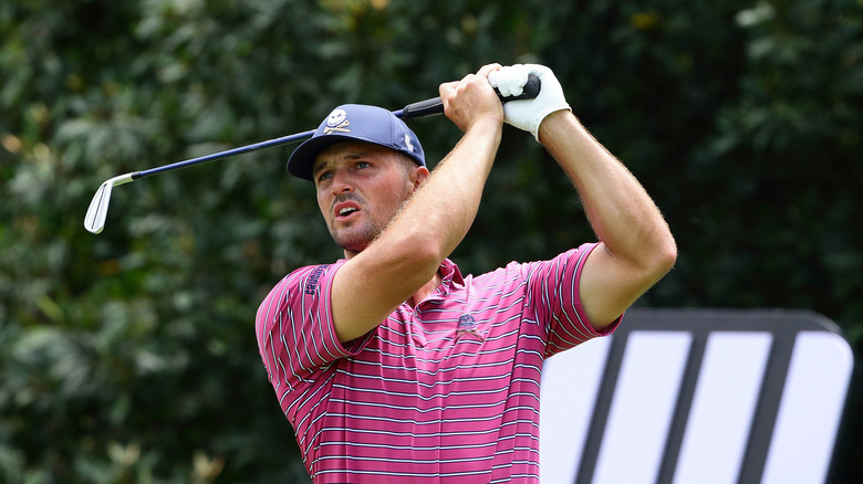 Bryson DeChambeau in a stripped shirt