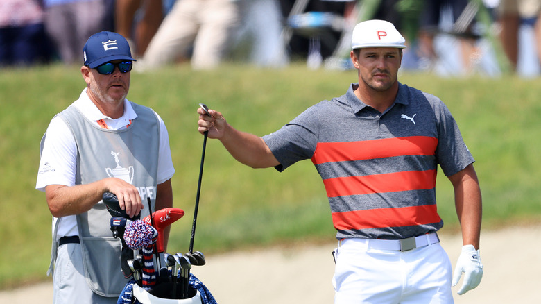 Bryson DeChambeau and Tim Tucker at the course