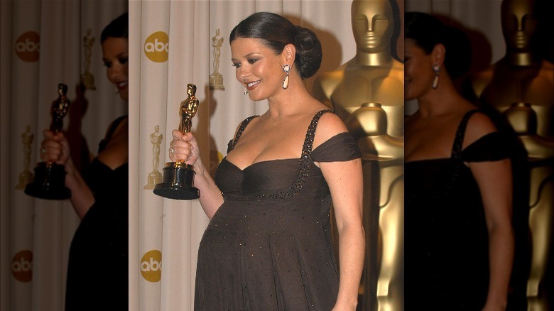 Catherine Zeta-Jones holding statue