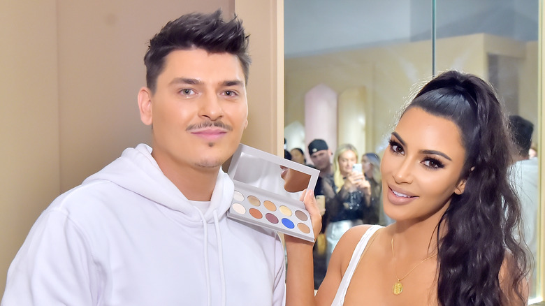 Mario Dedivanovic and Kim Kardashian at an event 