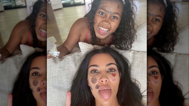 Kim Kardashian and daughter North take a selfie 