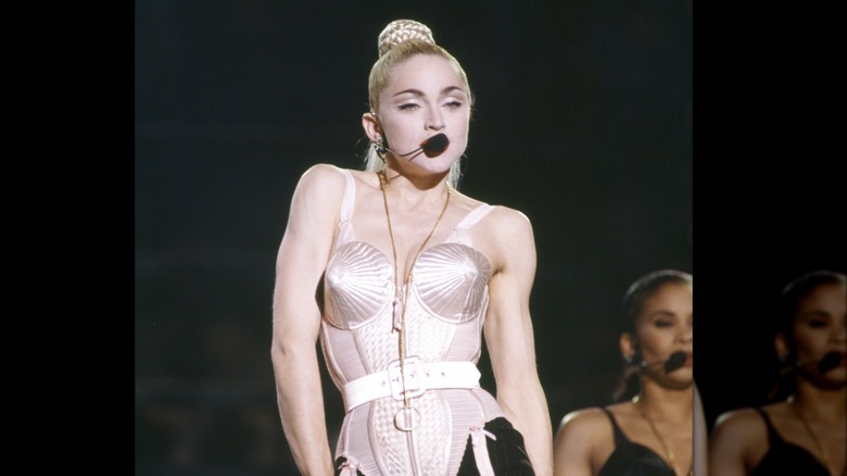 Madonna singing into microphone