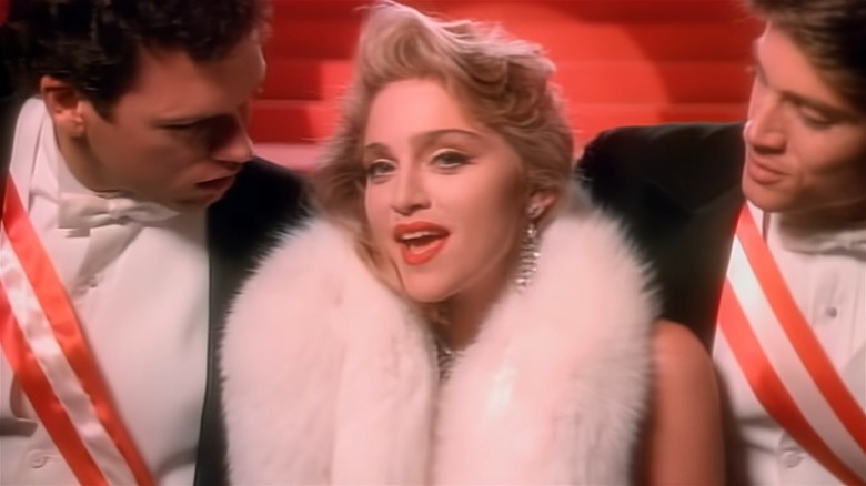 Madonna singing wearing fur stole 