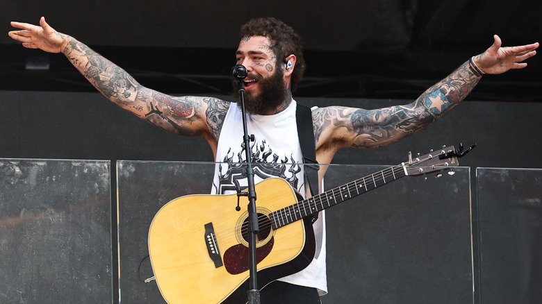 Post Malone posing on stage